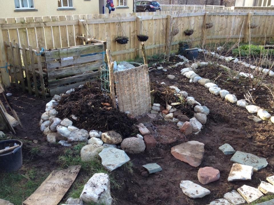Early garden with stone beds taking shape